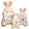 A big white rabbit plush toy, a sleeping doll on the bed, a cute baby bottle rabbit doll, a birthday gift for a girl Item Picture